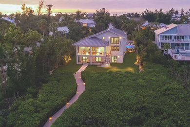 Island style exterior home photo in Tampa