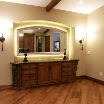 Custom Cabinetry with Stone Mirror Frame