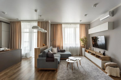 This is an example of a medium sized scandinavian living room in Moscow.