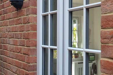 Photo of a traditional house exterior in Surrey.