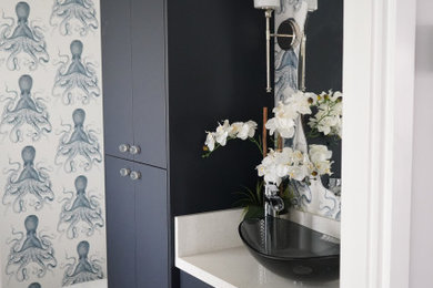 Inspiration for a contemporary powder room remodel in Hawaii