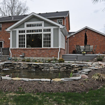 KITCHEN TO FAMILY ROOM TO SUNROOM TO WATERFEATURE