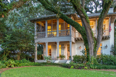 Elegant beige two-story exterior home photo in Other