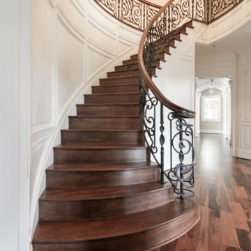 Project #74 | Circular Staircase with Hand-Forged Metal Panels