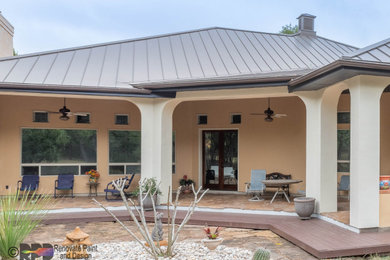 Large southwest porch idea in Austin with a roof extension