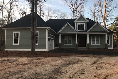 Mid-sized arts and crafts exterior home photo in Other