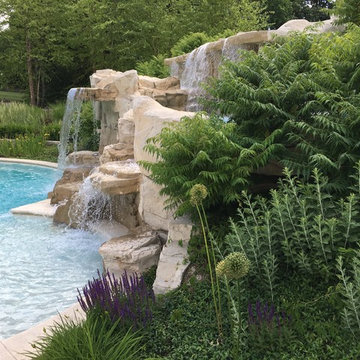 Cedar Rapids, Iowa - Custom Concrete Swimming Pool with Rock Waterfall Feature