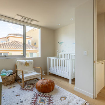 Bright Nursery Room with Soft Light and Warm Finishes