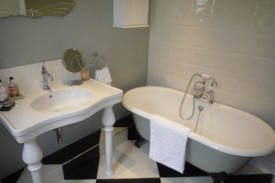 Medium sized victorian ensuite bathroom in London with shaker cabinets, white cabinets, a claw-foot bath, an alcove shower, a two-piece toilet, white tiles, mosaic tiles, blue walls and porcelain flooring.