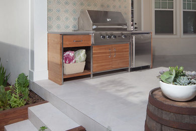 Design ideas for a contemporary backyard patio in Orlando.