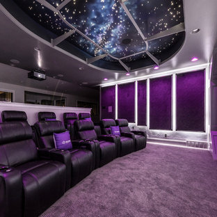 Photo of a large classic open plan home cinema in Salt Lake City with grey walls, carpet, a projector screen and grey floors.