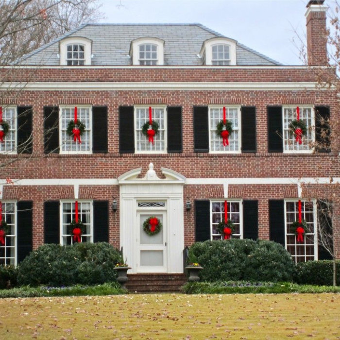 Brick house with christmas wreaths