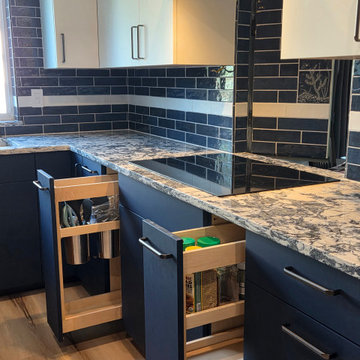 Blue and White Kitchen with Tiled Pass Through