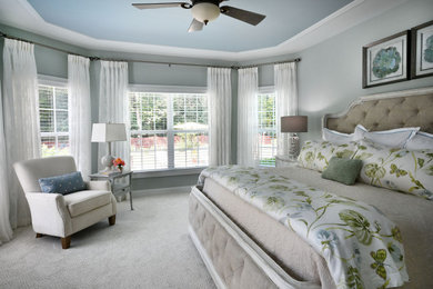 Example of a beach style home design design in Charlotte
