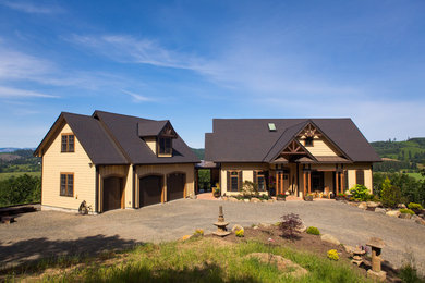 Large craftsman beige three-story exterior home idea in Portland with a shingle roof