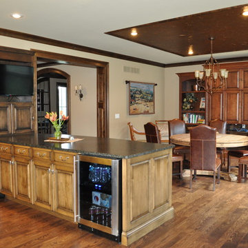 Sartell Redesign, kitchen, diningroom, sunroom, media room.
