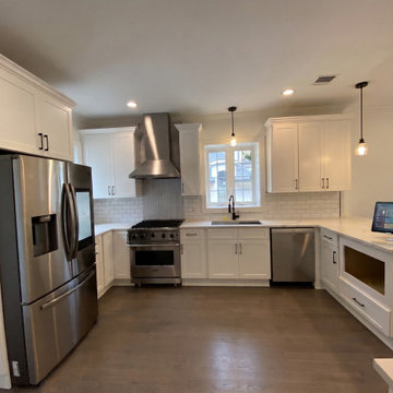 White Shaker Kitchen with Herringbone Backsplash