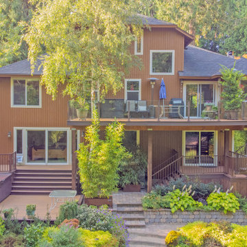 Multilevel Deck with Spiral Staircase & Glass Handrail