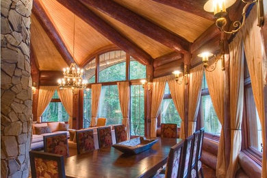 Example of a mountain style dining room design in New York