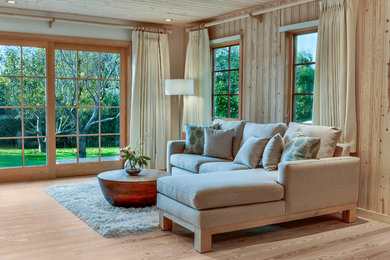 Danish master light wood floor bedroom photo in Other with beige walls