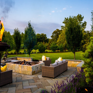 Entertain in this Backyard Landscape with Patio & Firepit: Perfect for Families!