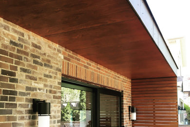 Minimalist concrete exterior home photo in Toronto