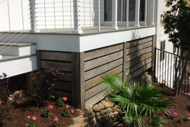 Inspiration for a large timeless rooftop deck remodel in San Diego with no cover