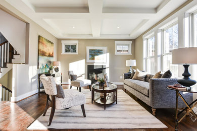 Mid-sized transitional formal and enclosed dark wood floor living room photo in Orange County with beige walls, a standard fireplace, a metal fireplace and no tv