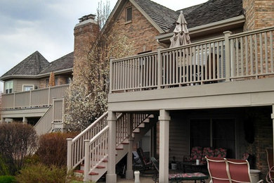 This is an example of a large traditional backyard deck in Chicago with no cover.