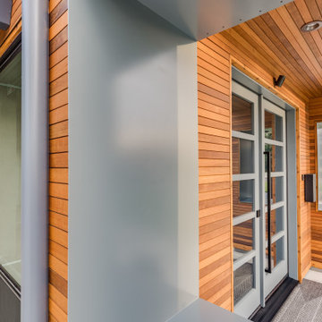 Steel Window Box with Recessed Can Lighting in Modern Western Red Cedar Entry