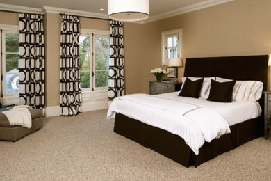 Large transitional master carpeted bedroom photo in DC Metro with beige walls and no fireplace