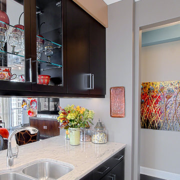 Glass front cabinets in galley kitchen