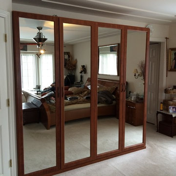Built-out Wardrobe Closet with Mirrored Doors