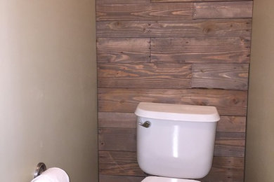 Inspiration for a rustic powder room remodel in Salt Lake City