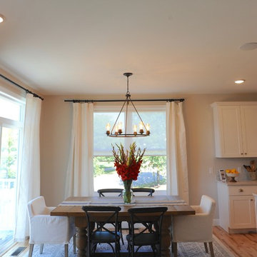 EcoSmart Roller Shade paired with linen drapery