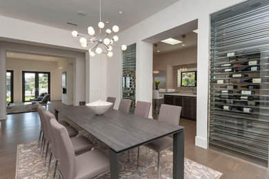 Inspiration for a large modern light wood floor great room remodel in Los Angeles with white walls
