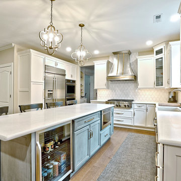 Stylish and Contemporary White Kitchen Remodel with a Blue Island