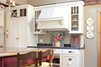 Enclosed kitchen - mid-sized farmhouse single-wall enclosed kitchen idea in Boston with an undermount sink, recessed-panel cabinets, white cabinets, granite countertops and an island
