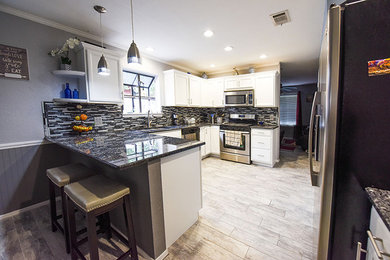 Inspiration for a contemporary u-shaped porcelain tile open concept kitchen remodel in Phoenix with a double-bowl sink, recessed-panel cabinets, white cabinets, granite countertops, multicolored backsplash, matchstick tile backsplash, stainless steel appliances and a peninsula