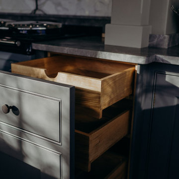 Pampas - Surrey showroom.  Spice drawers. Traditional kitchen details.