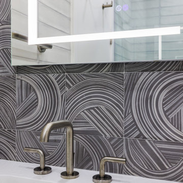 POWERFULLY DESIGNED BATHROOM PACKS A PUNCH.