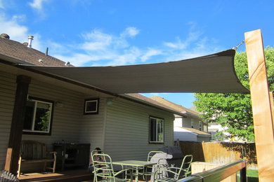 Mid-sized trendy home design photo in Vancouver