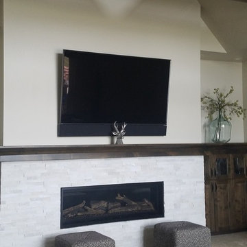 TV mounting with custom soundbar