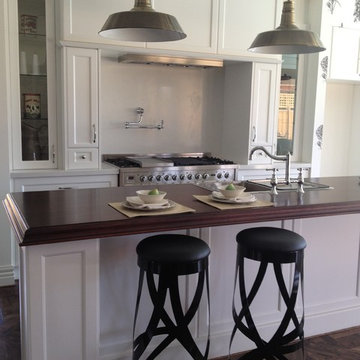 Balwyn North, Kitchen island with timber benchtop, showing traditional French co