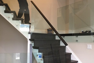 Inspiration for a modern staircase remodel in Toronto