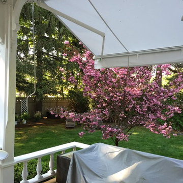 2 Aristocrat Eko Retractable Awnings Installed Over Back Deck