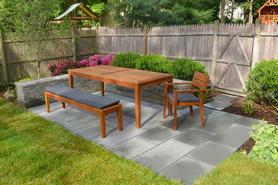 Patio - mid-sized traditional backyard concrete paver patio idea in Boston with no cover
