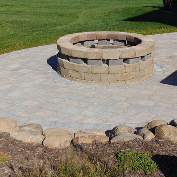 Simple addition to Patio with rock accents and mulch bed