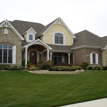 Batavia French Colonial Landscape with year round color and natural flagstone wa