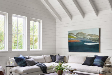 Example of a mid-sized transitional home design design in Boston